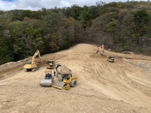 Earthmoving equipment in large dirt area